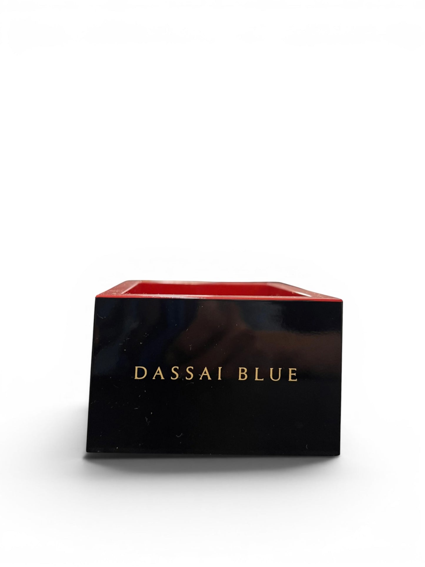 Dassai Blue traditional wooden Masu cup in black with red interior and gold logo branding